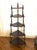 The stunning, antique, mahogany, five-tier corner etagere has beautifully turned, spindle supports and stick and ball...