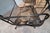 A handsome seven-piece American wrought-iron patio dining set by Russell Woodard, circa 1960s–1970s. The ensemble includes...