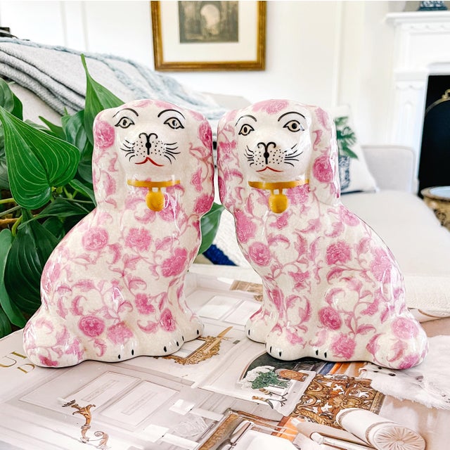 An adorable pair of petite 5.5" contemporary petite Staffordshire style Spaniel mantle dogs featuring a feminine pink...