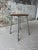 A truly extraordinary conversation piece with authentic history, this vintage metal pedestal stool was sourced in Round...
