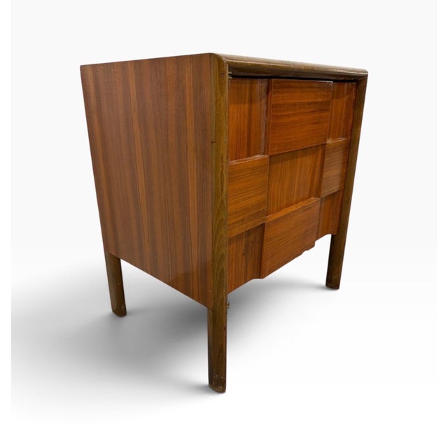 Striking Mid-Century Swedish Modern nightstand designed by Edmond Spence, dating to circa 1960. This distinctive piece...