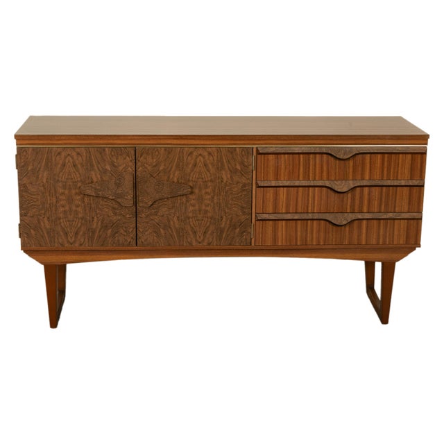A good vintage Mid Century Modern compact teak and Zebra wood credenza, sideboard, circa 1960. The credenza is made from...