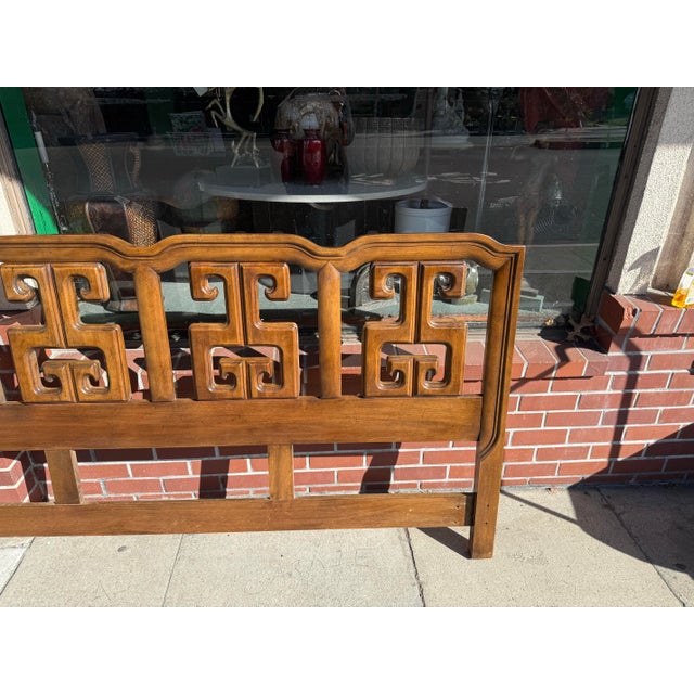 Elegant mid century modern headboard by Century Furniture Company. Walnut and in excellent condition with minor scuffs...