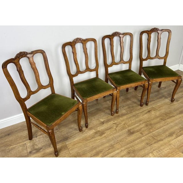 Enhance your dining space with this beautiful Set of 4 Vintage French Louis Dining Chairs , crafted from oak and featuring...