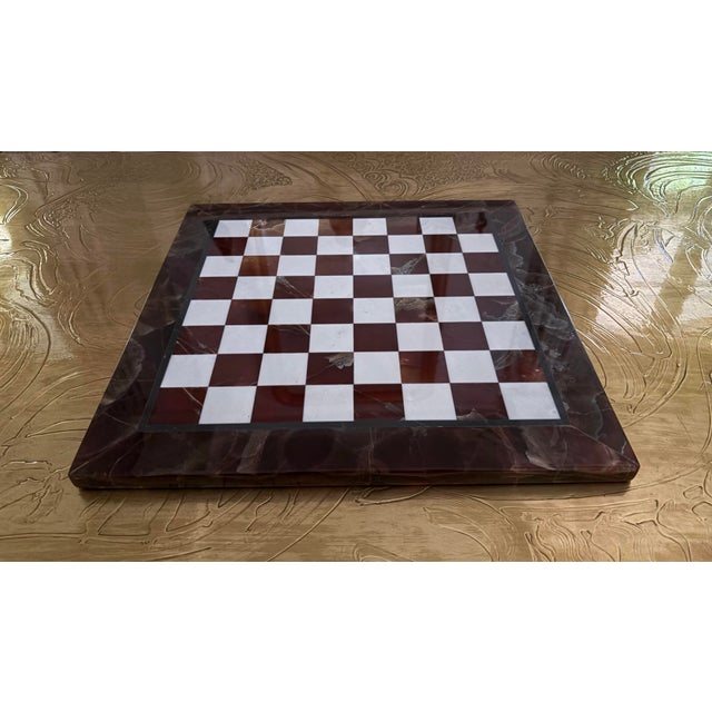 Beautiful large Italian marble chess board. Both a functional game and a striking tabletop object, it reflects the refined...