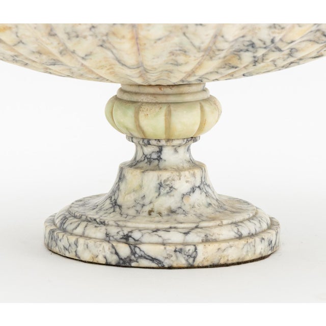 Italian Neoclassical Style Alabaster Tazza, with scalloped edge, fluted stem, and circular base. 5.75" H x 11.75"...