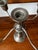 An elegant matched pair of convertible sterling silver candelabras by Duchin Creation, American, circa 1950s. Each piece...