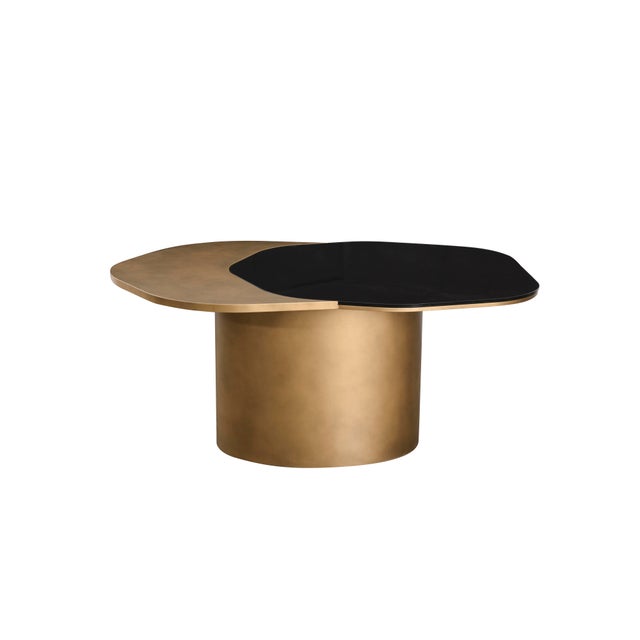 The Modern Irregular Kaylee Dining Table is here to impress. Add a touch of luxury to your dining room with this unique...