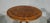 A Victorian burr walnut and marquetry inlaid oval breakfast table, tilting, quarter-veneered top, quatre-column support,...