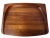 Offered is a rather rare and symmetrical, thick, rectangular and slanted staved and lathed Teak wood carving board and...