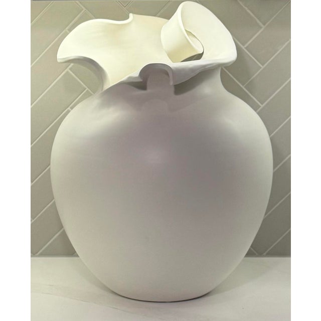 Sculptural Charlotte Italian ceramic vase designed by Ashley Childers for Global Views. This striking contemporary form...