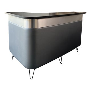 Large Boomerang Shaped Home Bar With Brushed Metal Accent For Sale