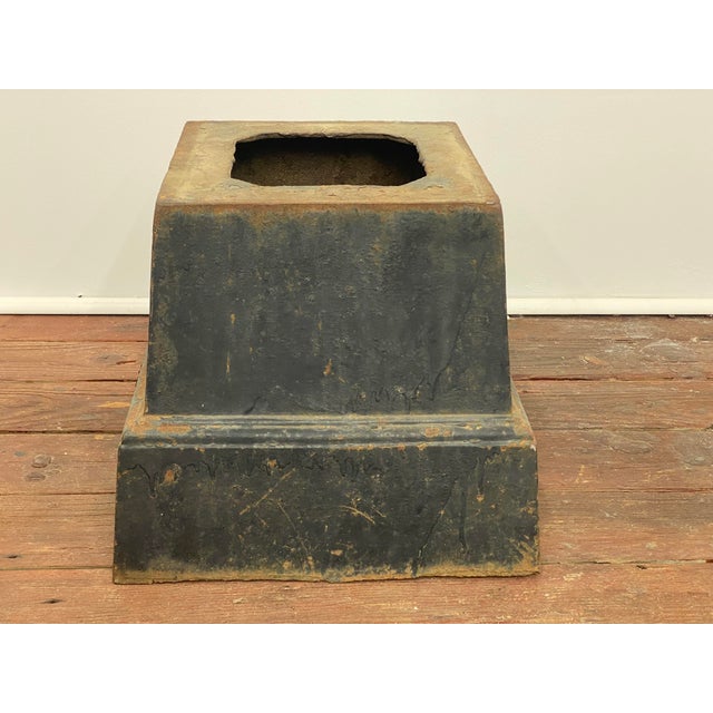 Early 20th century tapered cast iron planter base. Good overall condition with minor rust and drip overpaint. Structurally...