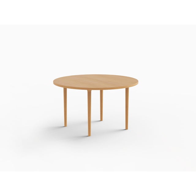 Minimalist Modern Cast Table Round in Ash Wood by Pedro Sotomayor, in New conditions. Designed from 2000 Signed by Maker