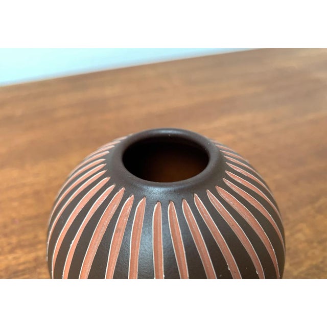 Mid-Century German Wormser Terra-Sigillata Pottery Vase, 1960s, in Very Good conditions. Designed 1960 to 1969 This piece...