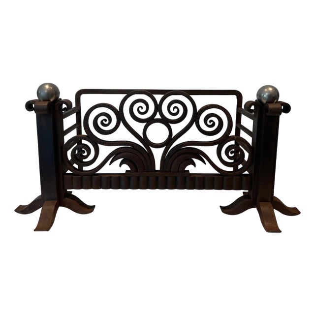 Baskets or andirons in wrought and hammered iron and chrome For Sale