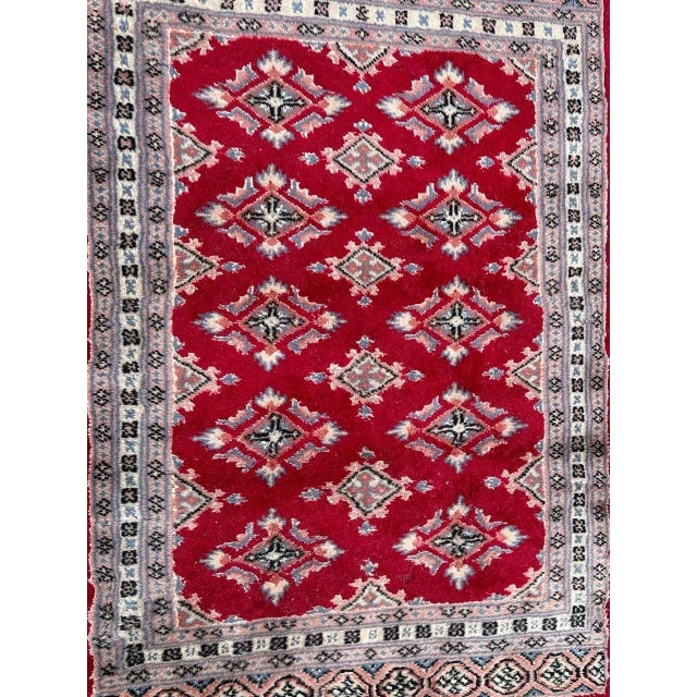 Pretty small vintage Pakistani rug with nice geometrical design in style of Turkmen rugs, and beautiful colours with red...