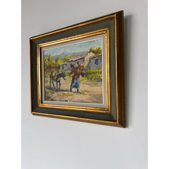 A vibrant 1970’s vintage impressionist oil painting on masonite, depicting a rustic Spanish countryside scene. The...