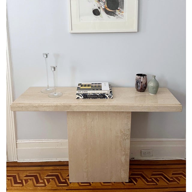 A pair of modern glass candlesticks. Metal liners in candlestick holder. Dimensions of large candlestick: 5" diameter...