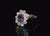 GIA certified 3.15CTS diamond and purple pink sapphire 18K solid gold ring. This ring features a large 1.43CTS natural no...