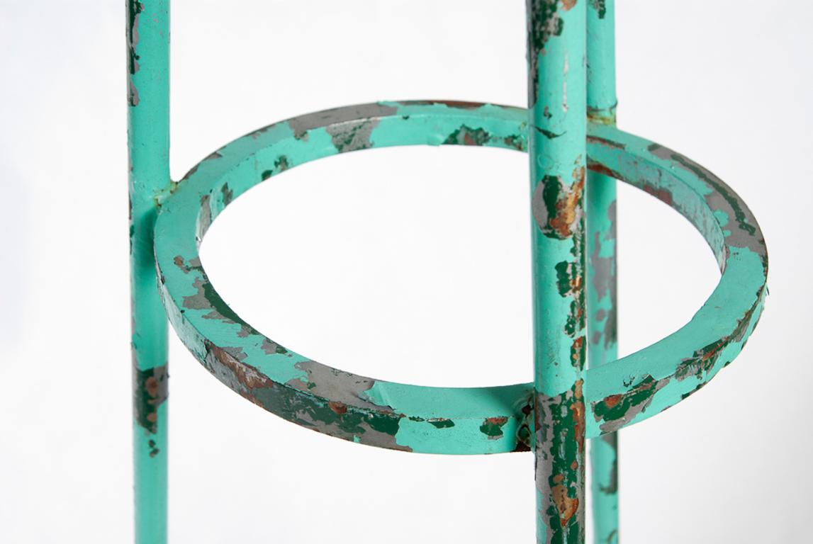 green tripod floor lamp