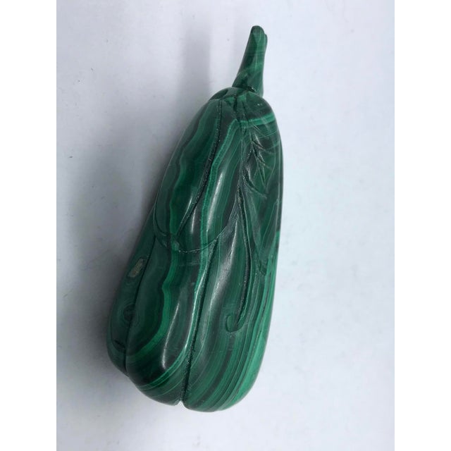 Malachite is a copper carbonate mineral that forms in the upper layers of oxidized ore bodies. Until the discoveries in...
