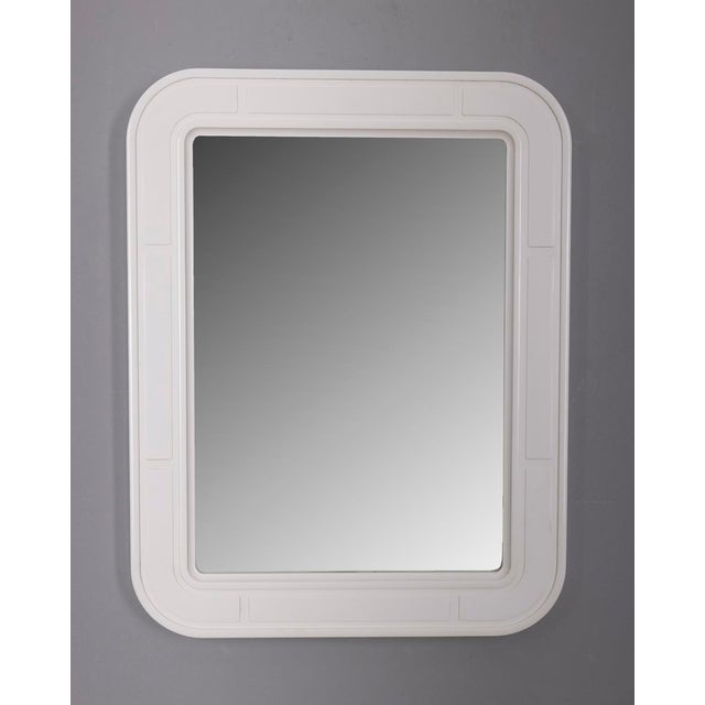 Rectangular wall mirror with decorated plastic frame, designed by Carrara Matta, 1960s. This piece has an attribution...