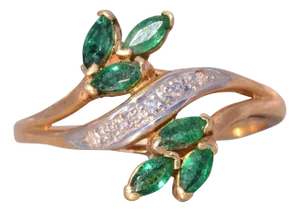 The Bifan: Emerald and Natural Diamond Bypass Ring in Yellow Gold