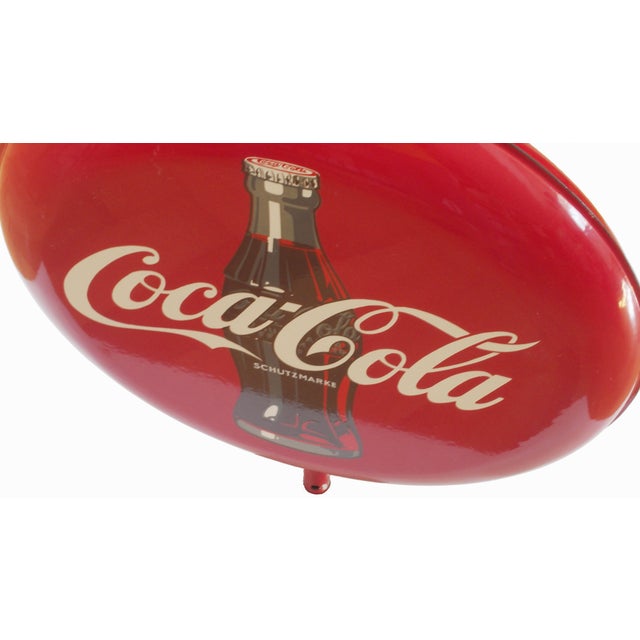 This large enameled double-sided sign (identical on both sides) was originally made to be used outside cafes and beer...