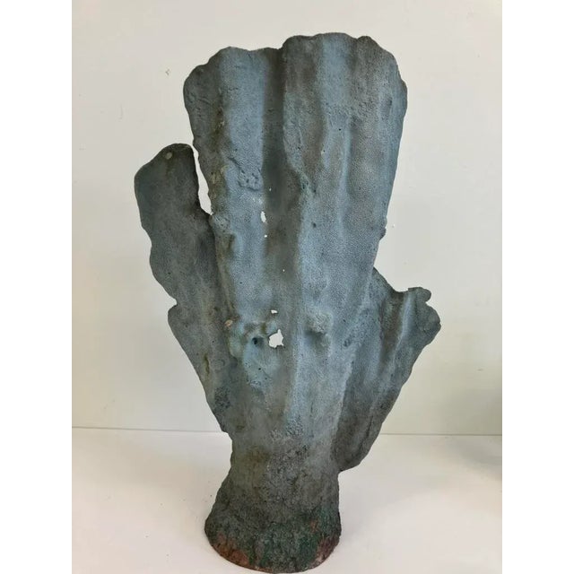 Date: Circa 1960s–1970s Material: Hand-formed and textured metal with aged patina This striking mid-20th century metal...