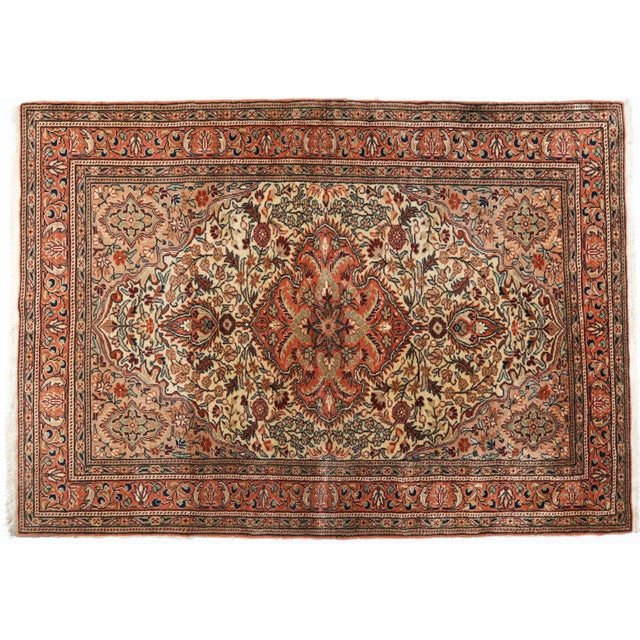 This elegant vintage Kayseri rug is finely hand-knotted with wool pile on a cotton foundation, reflecting the...
