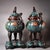 This striking pair of tripod incense burners is masterfully crafted from bronze and richly decorated with cloisonné...