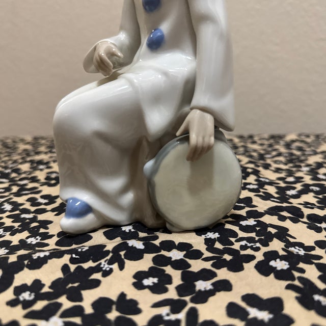 Add a touch of whimsical charm to your collection with this vintage porcelain clown figurine by Casades, beautifully...