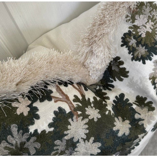 This lovely embroidered fabric with it 's leafy towering trees, is light and airy against an off white ground. Shades of...