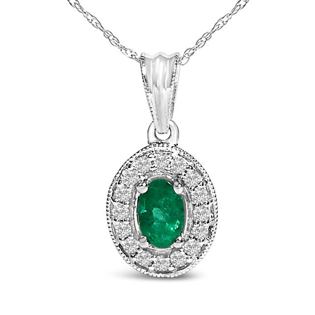 Envelop your decolletage with the verdant charm of this enchanting necklace, meticulously crafted from rhodium-plated 14K...