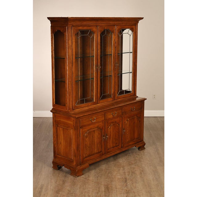 High Quality American Made Traditional Style China Cabinet By Ethan Allen. Constructed Of Solid Oak With Paneled Casework...