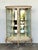 Elevate your interior with this exquisite vintage French-style display cabinet, featuring a graceful bow-front silhouette...