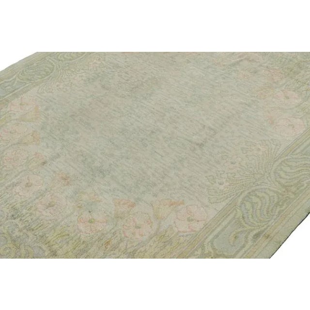 Hand-knotted in wool circa 1900-1910, this 9x11 antique Arts & Crafts rug is believed to be a rare work from C.F.A....