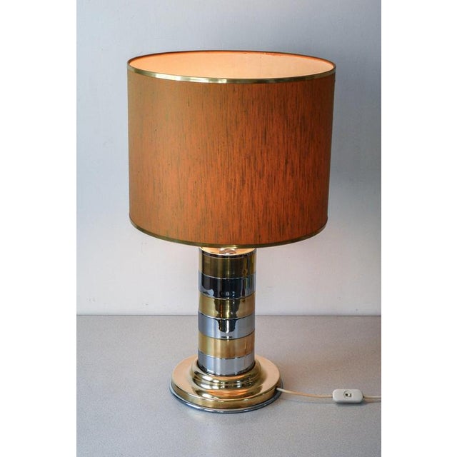 Table lamp made of two-tone chrome metal gold and silver plated. italian design from the 1970s origin italy period 1970s...