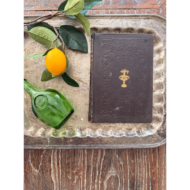 Published in 1852, this fascinating antique household guide includes recipes for ice creams, preserves, jellies, perfumes,...
