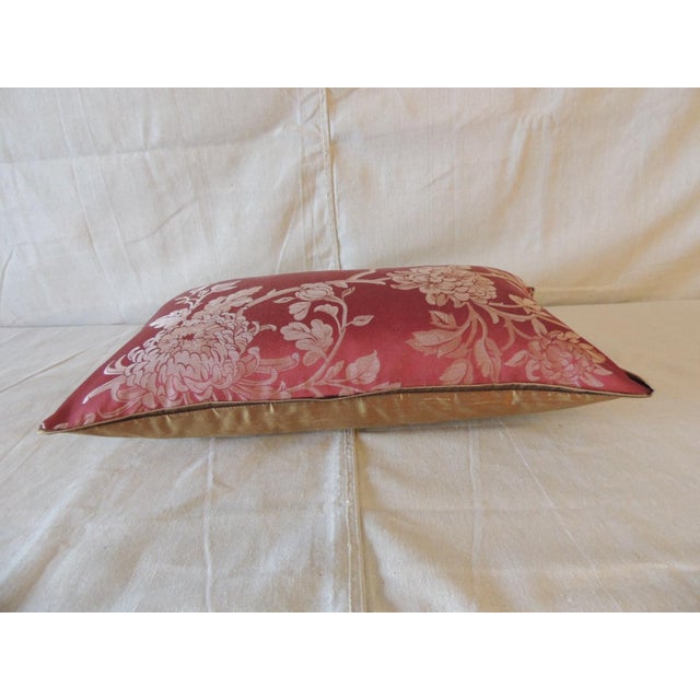 Red Silk Floral Decorative Lumbar Pillow with golden silk backing And flat silk trim all around. Feather/down insert Hand...