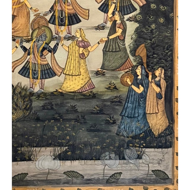 Signed gouache painting on cloth with scenes from the life of Lord Krishna. The subject matter depicts the Raasleela, or...