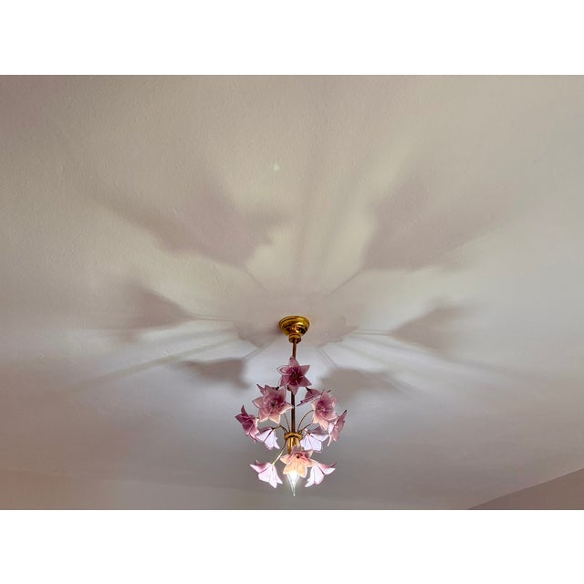 Vintage Mid-Century Italian Murano Style Hand-Painted Pink Glass Blossom Chandelier Bring romantic Italian elegance into...