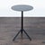 Designed by Konstantin Grcic, this table is aluminum and is for indoor or outdoor use. The top folds down. Brand: Plank....