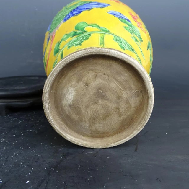 This product is a vintage Yellow Ground Famille Verte Porcelain Vase hand painted with a Dragon Phoenix pattern. Made in...