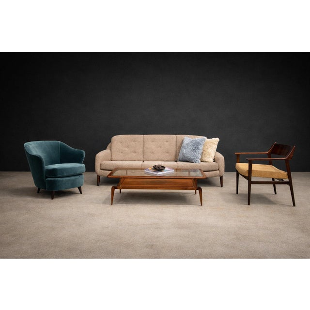 An elegant and sculptural example of Brazilian modern design, the “Concha” armchair by Joaquim Tenreiro exemplifies the...