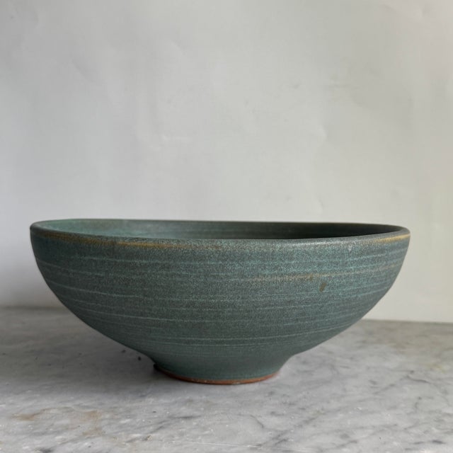 I don't know much about this unmarked studio pottery ceramic bowl other than it is a fantastic piece. It is glazed with a...