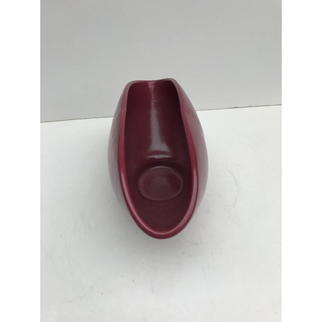 This is an unique bowl, the cranberry color is awesome, as well as the shape. It is difficult to see in the photographs,...