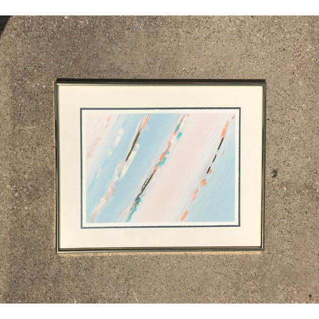 This beautiful mixed media art is simple but a statement maker. Blues, teals, orange, pink and peach with glittery flakes...