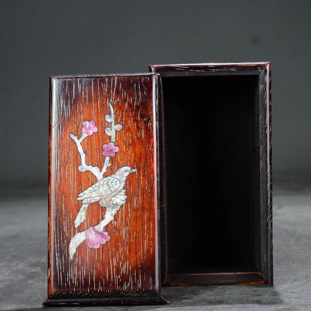 This elegant rectangular wooden keepsake box showcases classic Chinese **Magpie and Plum Blossom (Xi Shang Mei Shao)**...